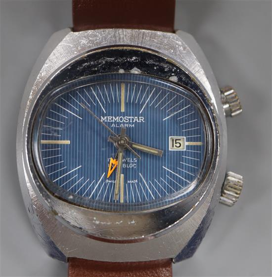 A 1970s? steel Memostar alarm manual wind wrist watch, on associated leather strap.